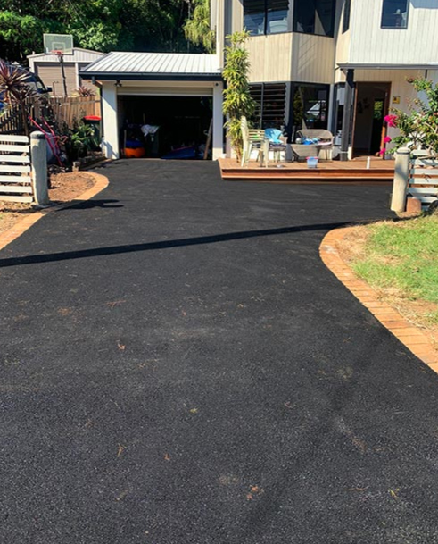 Driveway after asphalt resurfacing by Colossal Asphalt