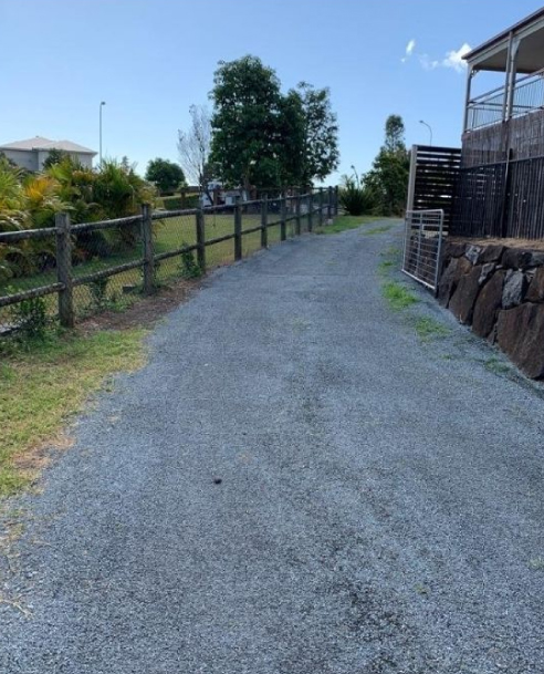 Driveway before asphalt resurfacing by Colossal Asphalt