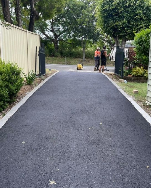 Driveway after asphalt resurfacing by Colossal Asphalt